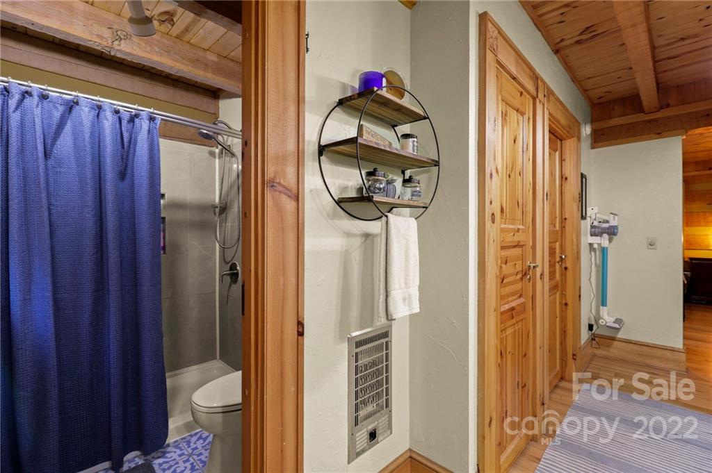 431 Silas Creek Road, Unit 4 Lansing, NC 28643 - Photo 25 of 46 a bathroom with a toilet and a shower