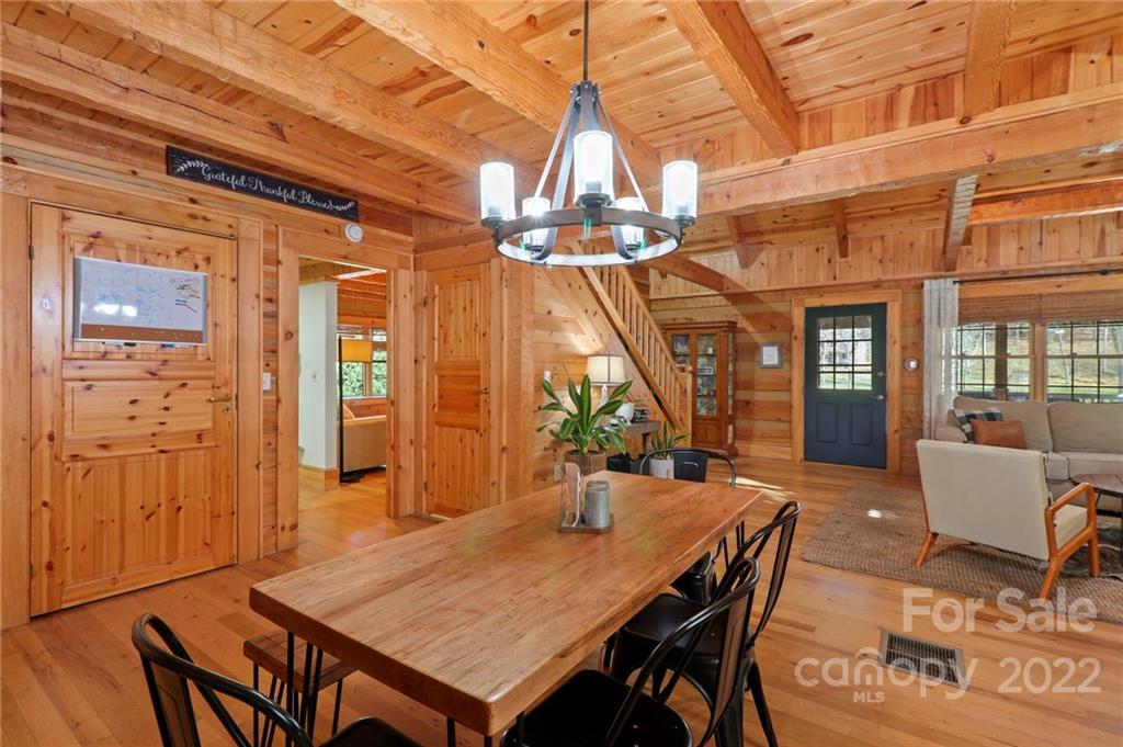 431 Silas Creek Road, Unit 4 Lansing, NC 28643 - Photo 7 of 46 a dining room with a table and chairs