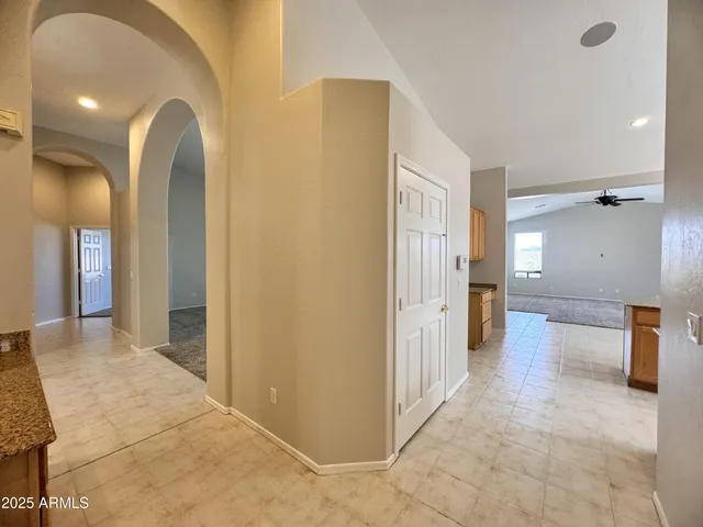 a view of a bathroom with a tub and shower