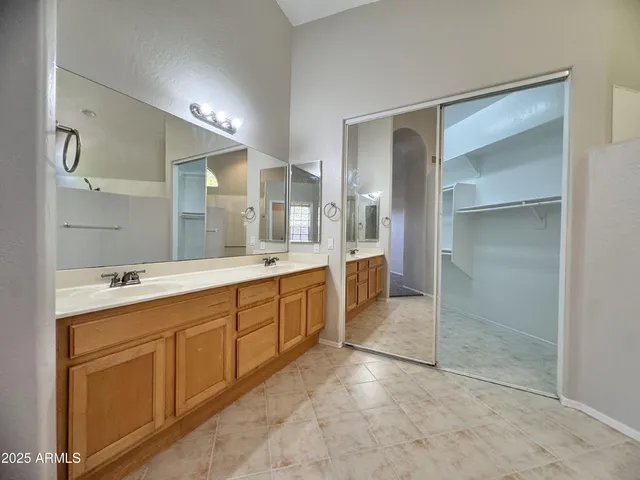 a view of a chairs and table in patio