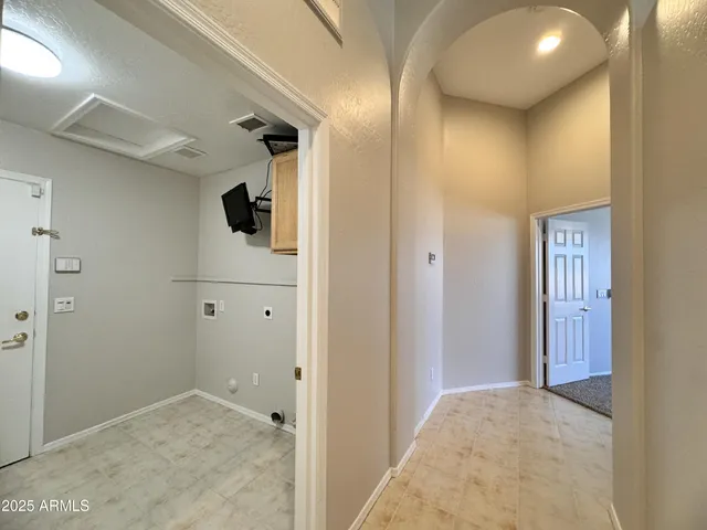 a view of a house with swimming pool and a yard