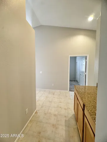 a view of a backyard with sitting area