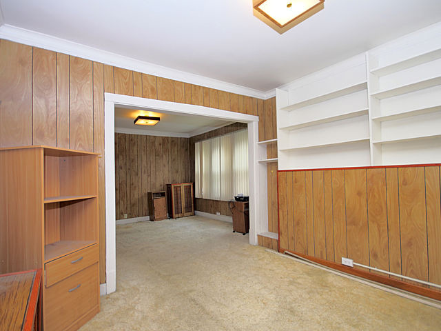 2005 Darrow Avenue Evanston, IL 60201 - Photo 13 of 24 a view of a hallway with wooden shelves