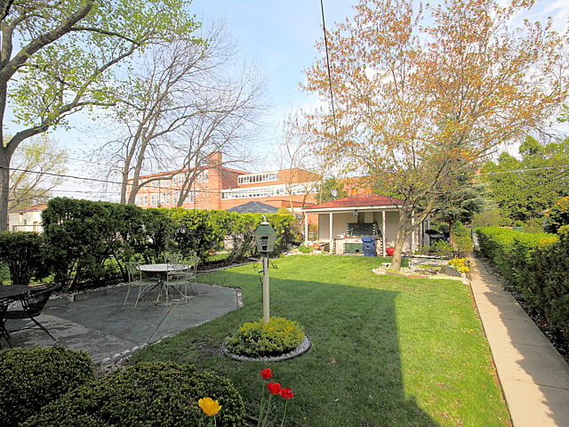 2005 Darrow Avenue Evanston, IL 60201 - Photo 2 of 24 a view of a patio with chair and tables back yard of the house