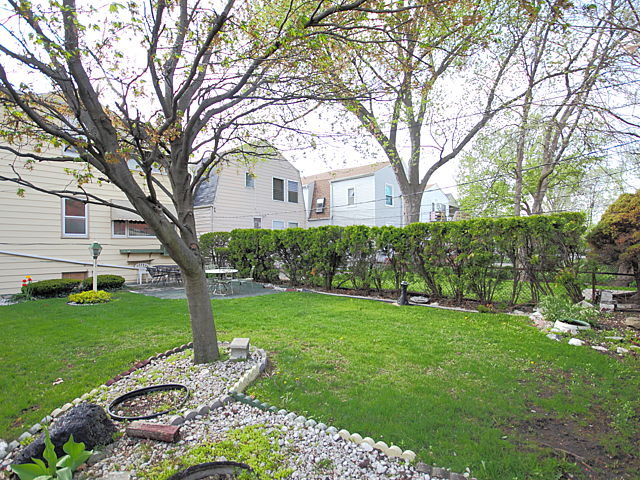 2005 Darrow Avenue Evanston, IL 60201 - Photo 23 of 24 a front view of a house with garden