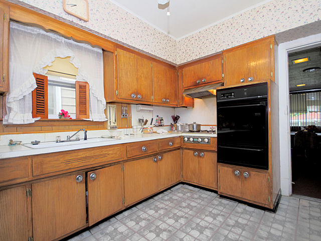 2005 Darrow Avenue Evanston, IL 60201 - Photo 6 of 24 a kitchen with granite countertop stainless steel appliances and sink