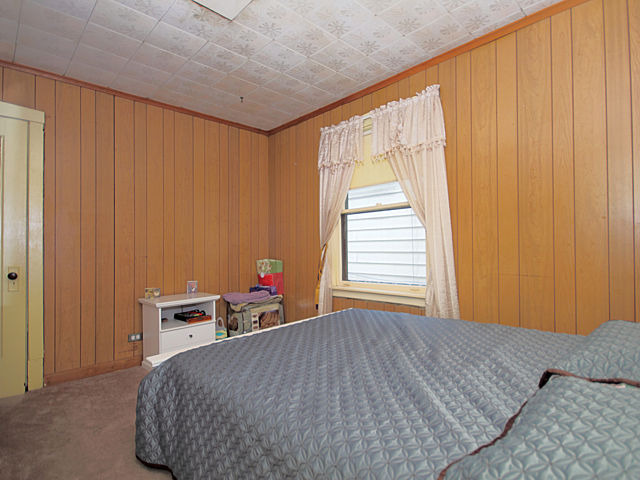 2005 Darrow Avenue Evanston, IL 60201 - Photo 7 of 24 a bedroom with a bed and a window