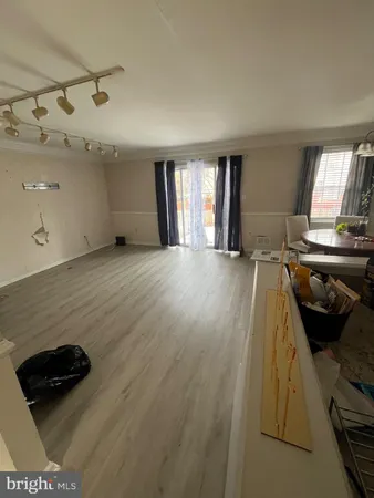 a view of a livingroom with furniture and window