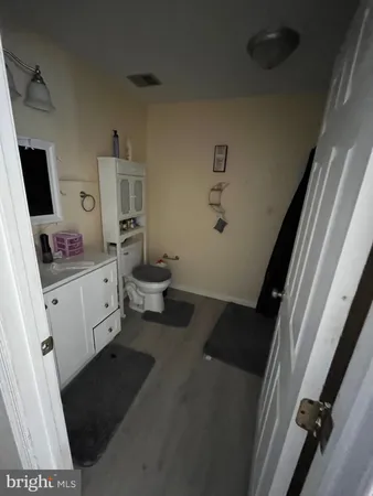 a view of a room with baby crib