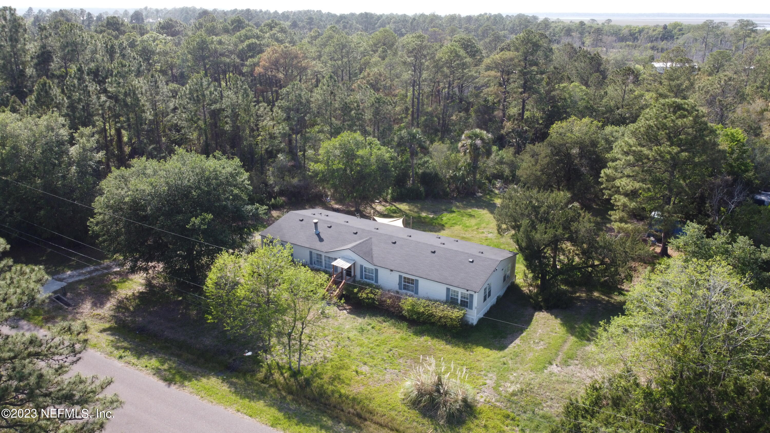 16055 Shellcracker Road Jacksonville, FL 32226 - Photo 20 of 32 an aerial view of a house with a yard