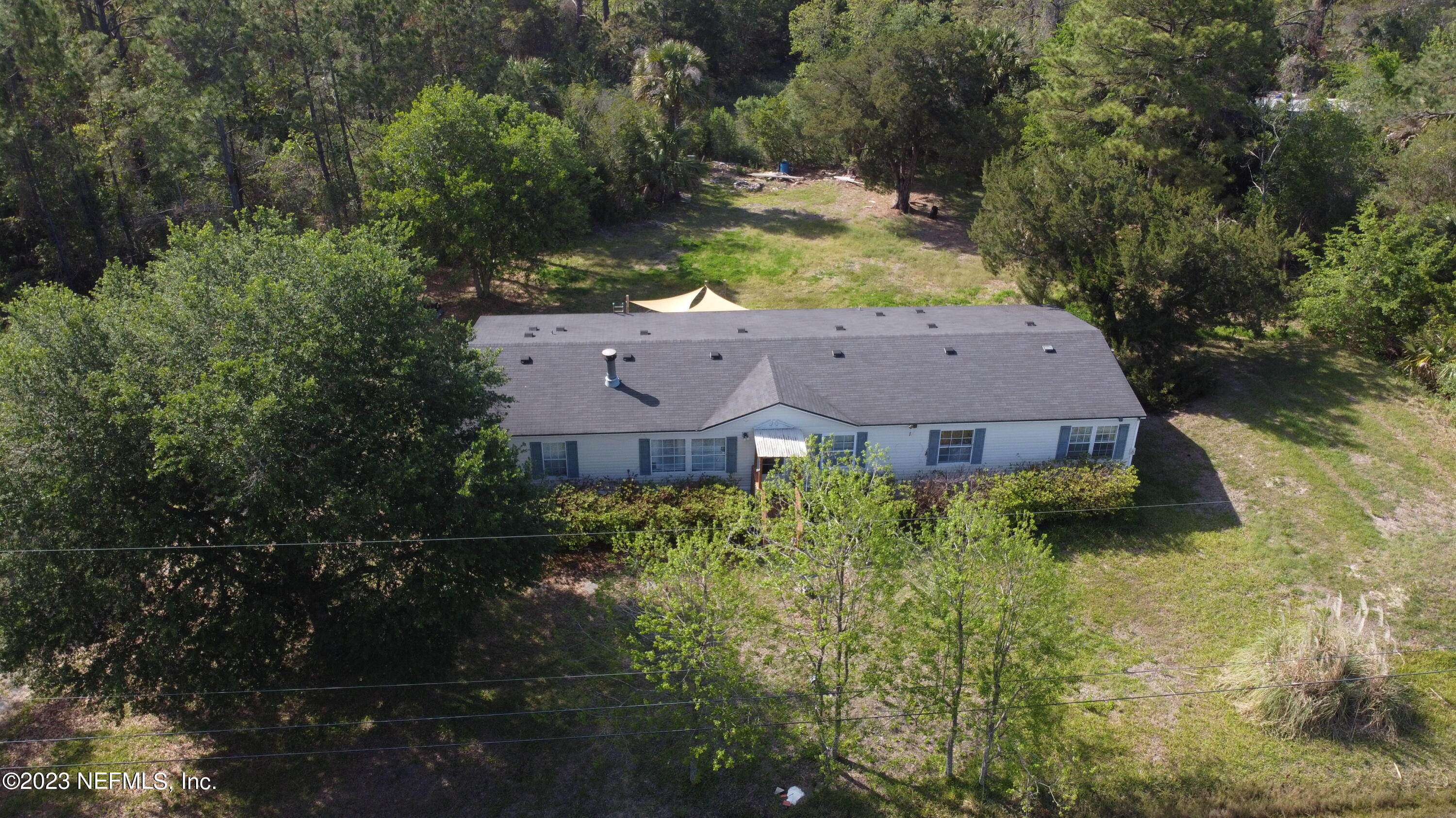 16055 Shellcracker Road Jacksonville, FL 32226 - Photo 2 of 32 an aerial view of a house with garden space and street view