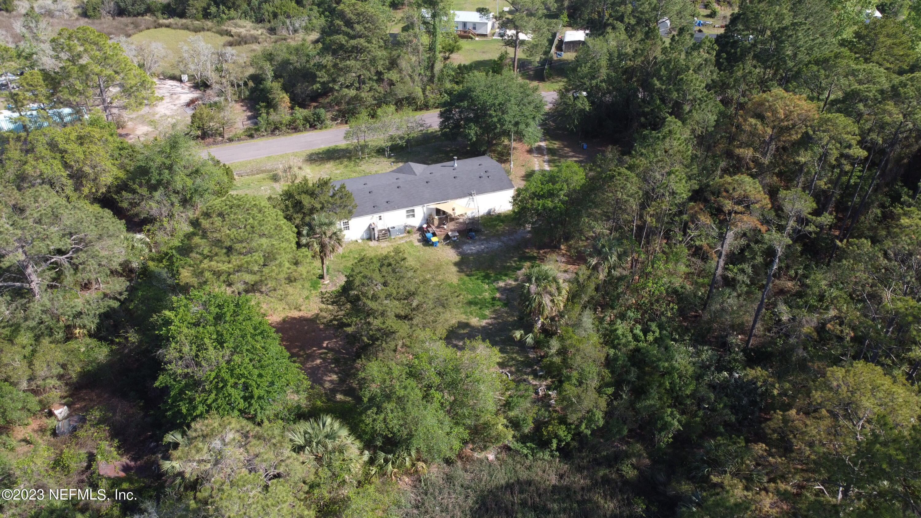 16055 Shellcracker Road Jacksonville, FL 32226 - Photo 22 of 32 an aerial view of residential house with outdoor space and trees all around