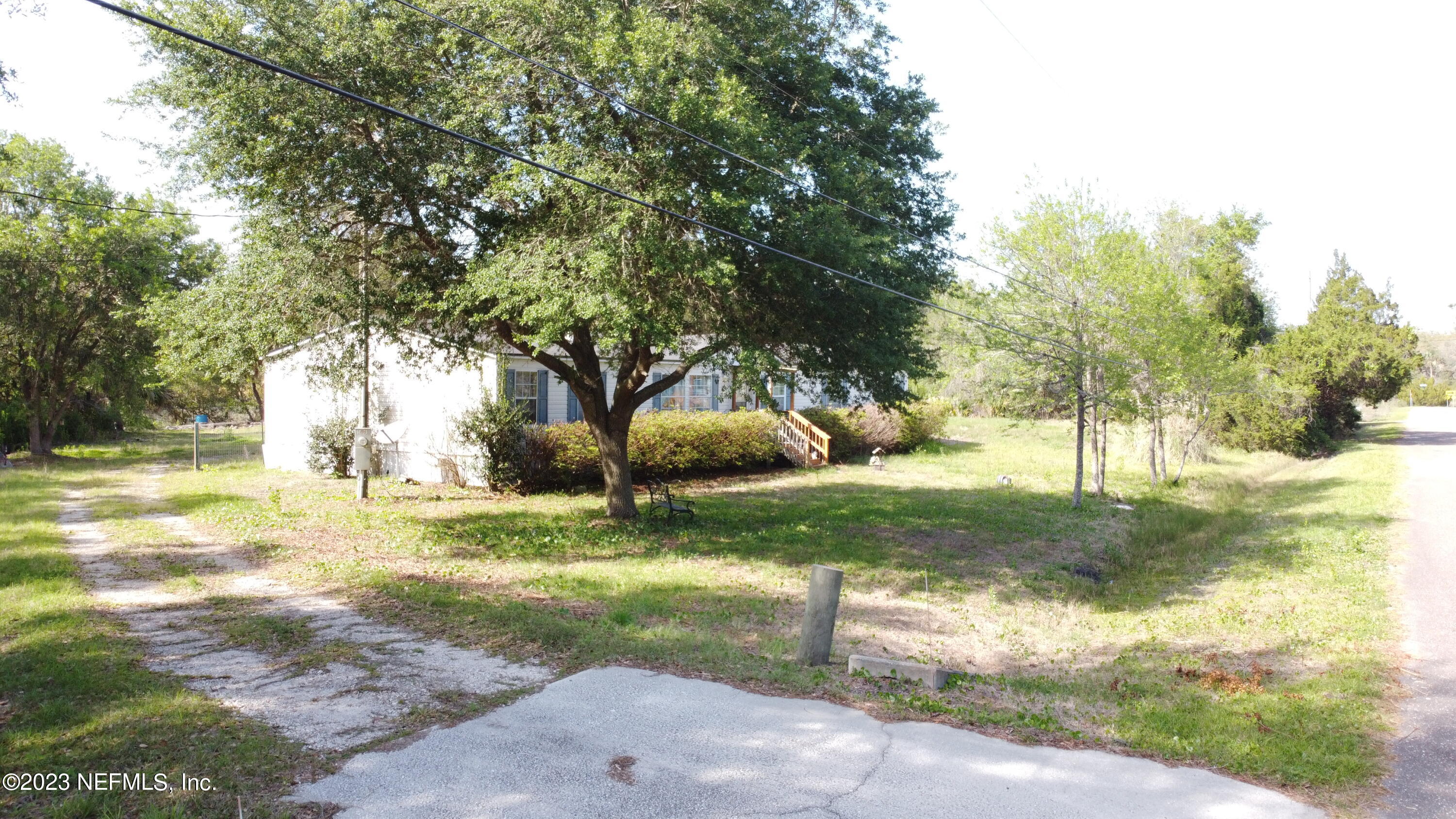 16055 Shellcracker Road Jacksonville, FL 32226 - Photo 28 of 32 a view of a yard with a tree