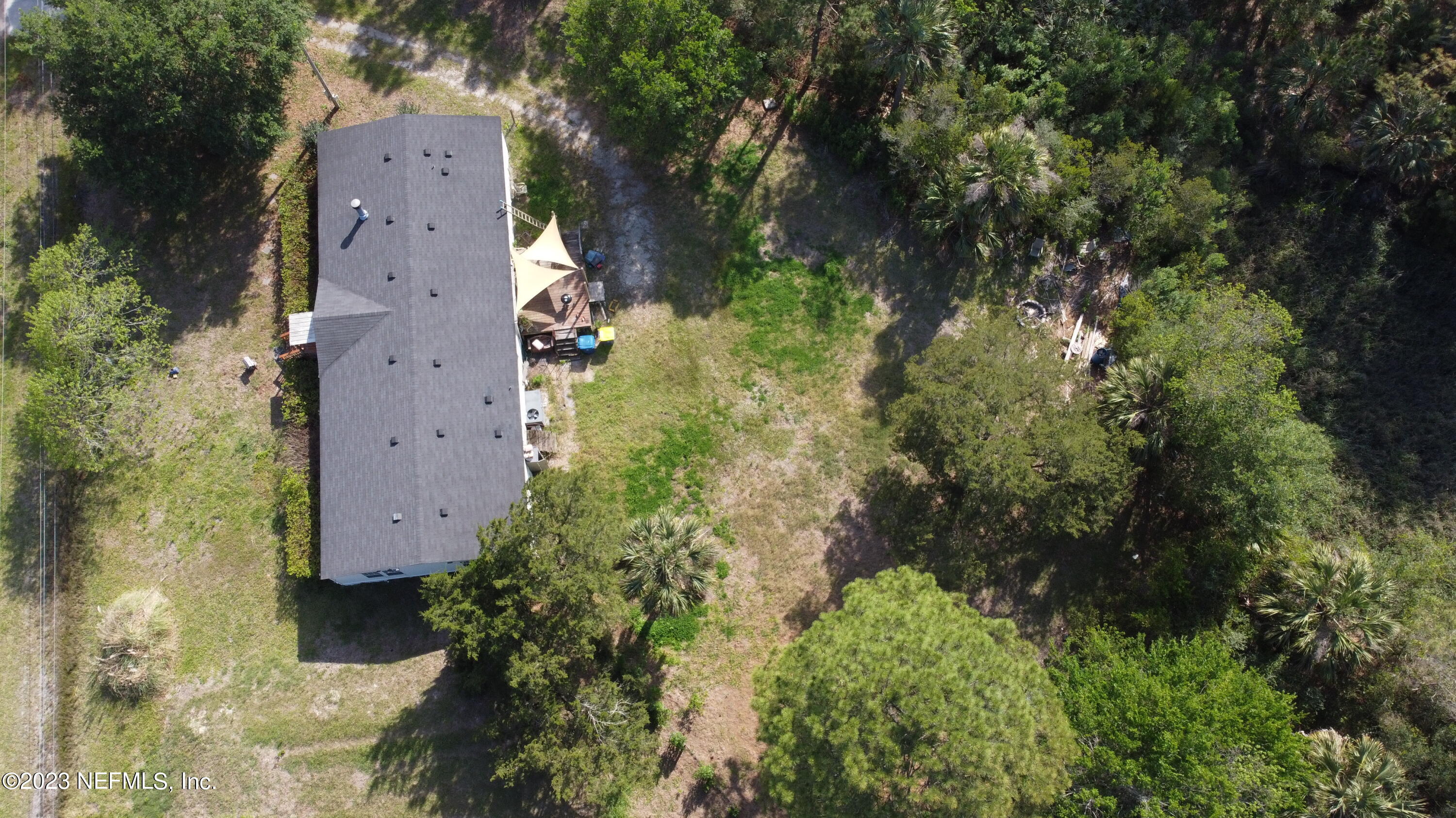 16055 Shellcracker Road Jacksonville, FL 32226 - Photo 32 of 32 an aerial view of residential house with outdoor space and trees all around