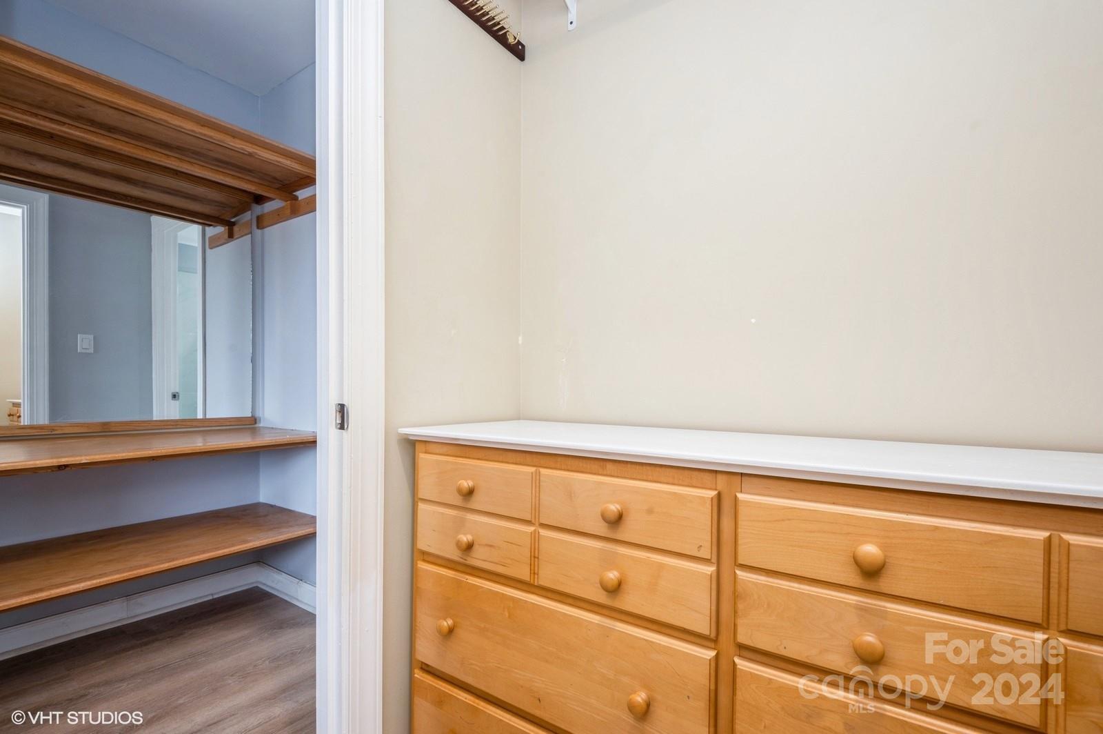 13822 Queens Harbor Road, Unit H Charlotte, NC 28278 - Photo 24 of 37 a view of small space with racks on the wall