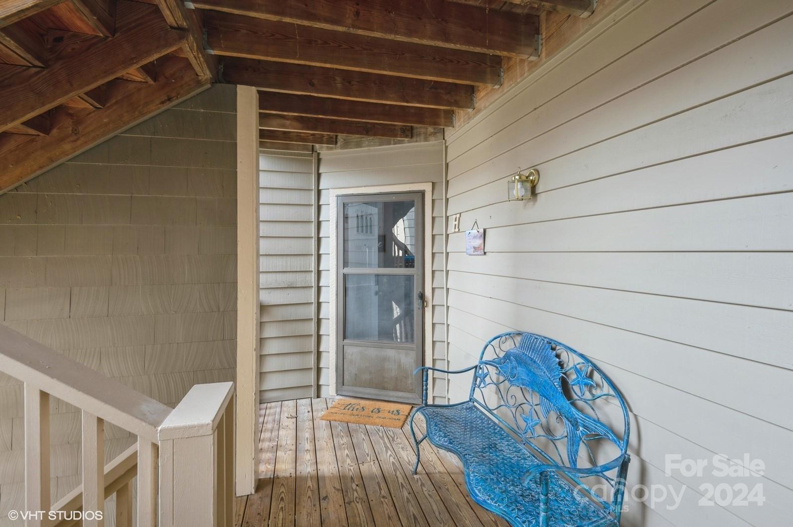13822 Queens Harbor Road, Unit H Charlotte, NC 28278 - Photo 34 of 37 a view of entryway with wooden floor