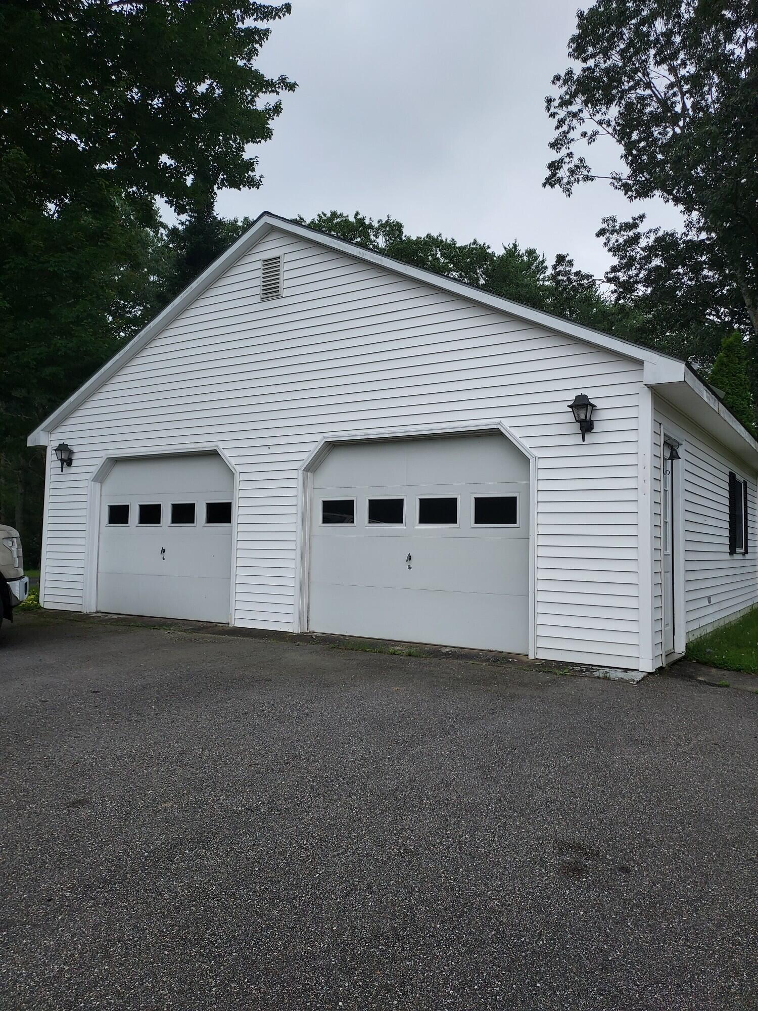 274 Log Cabin Road Arundel, ME 04046 - Photo 9 of 42 garageoutsidefront