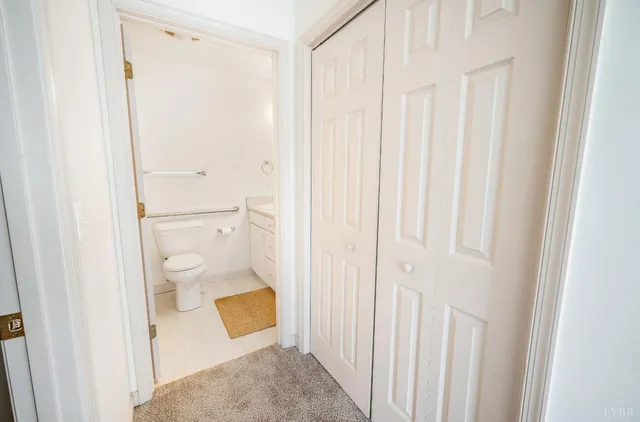 a bathroom with a shower and a toilet