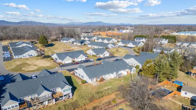 a view of a brick wall with windows