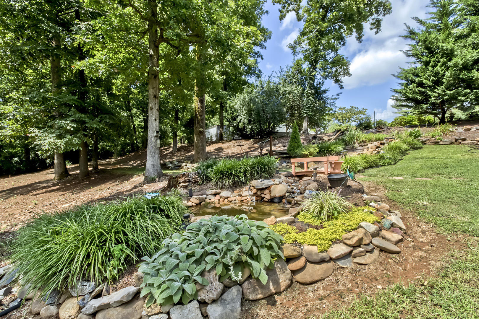 1038 Kirk Road Greenback, TN 37742 - Photo 33 of 40 33_KirkRoad_1038_BackWaterFeature01