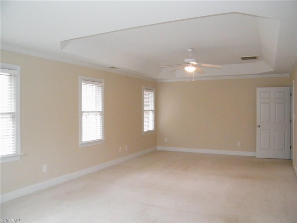 8413 Case Ridge Drive Oak Ridge, NC 27310 - Photo 18 of 30 Natural lighting abounds in the Master bedroom