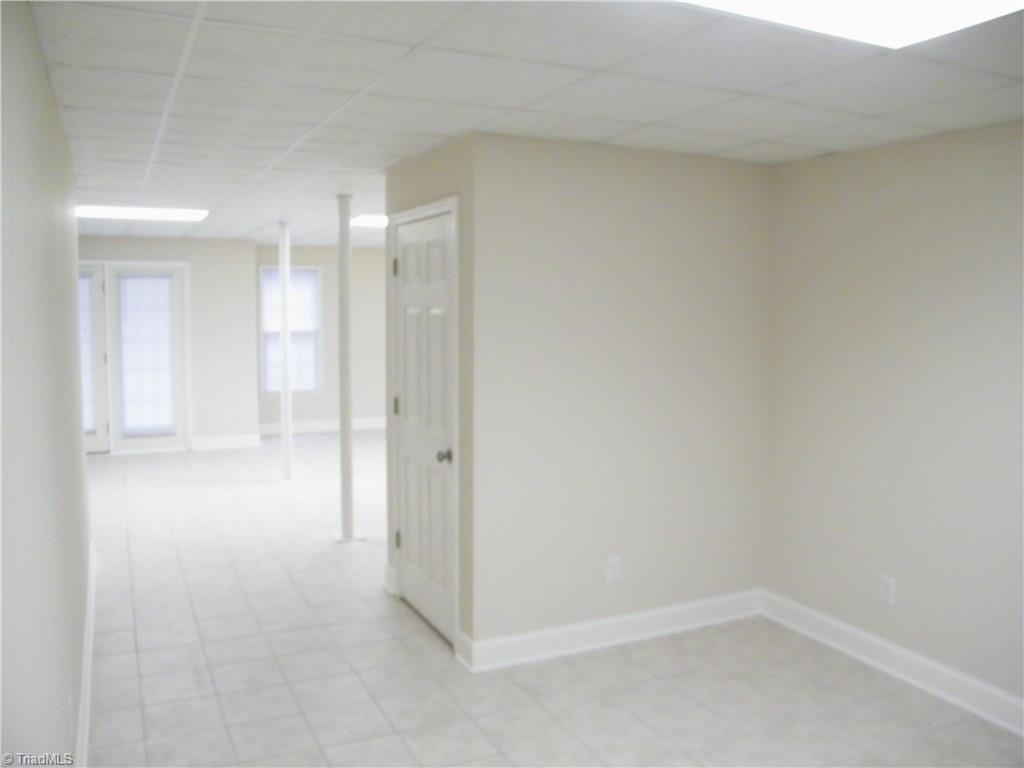 8413 Case Ridge Drive Oak Ridge, NC 27310 - Photo 23 of 30 Great space for refrigerator, table and chairs