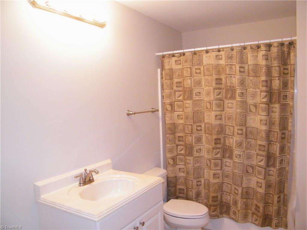 8413 Case Ridge Drive Oak Ridge, NC 27310 - Photo 25 of 30 Adjoining bath to lower level guest room