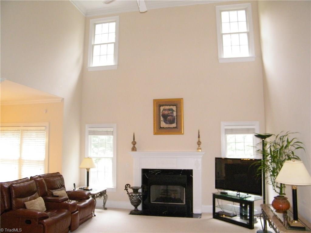 8413 Case Ridge Drive Oak Ridge, NC 27310 - Photo 4 of 30 Greatroom with abundant natural lighting