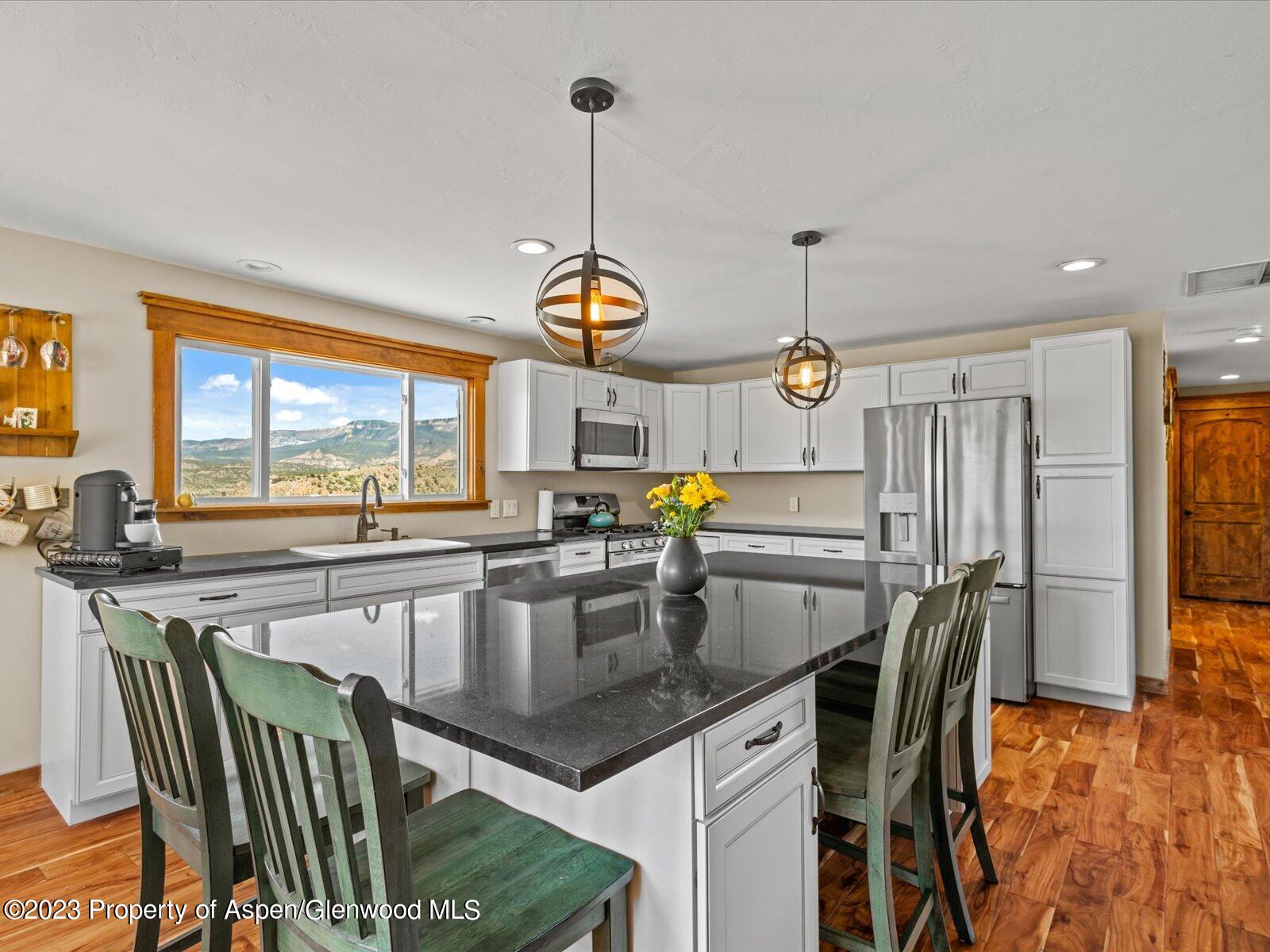 467 297 County Road Rifle, CO 81650 - Photo 10 of 33 Kitchen with large island