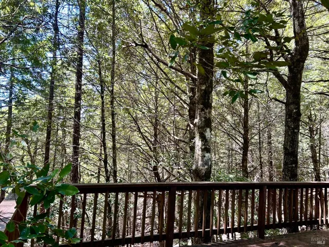 a view of balcony with trees