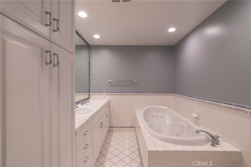 1735 Claridge Street Arcadia, CA 91006 - Photo 11 of 18 a bathroom with a bathtub and a sink