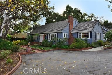 1735 Claridge Street Arcadia, CA 91006 - Photo 2 of 18 a front view of a house with a garden