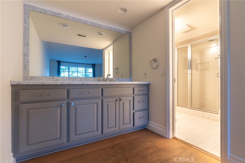 1735 Claridge Street Arcadia, CA 91006 - Photo 10 of 18 a view of a bathroom with a sink mirror and window