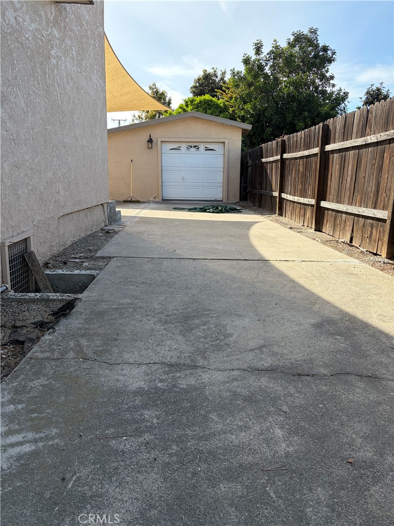 141 Harding Avenue Anaheim, CA 92804 - Photo 10 of 15 3 car parking driveway with gate