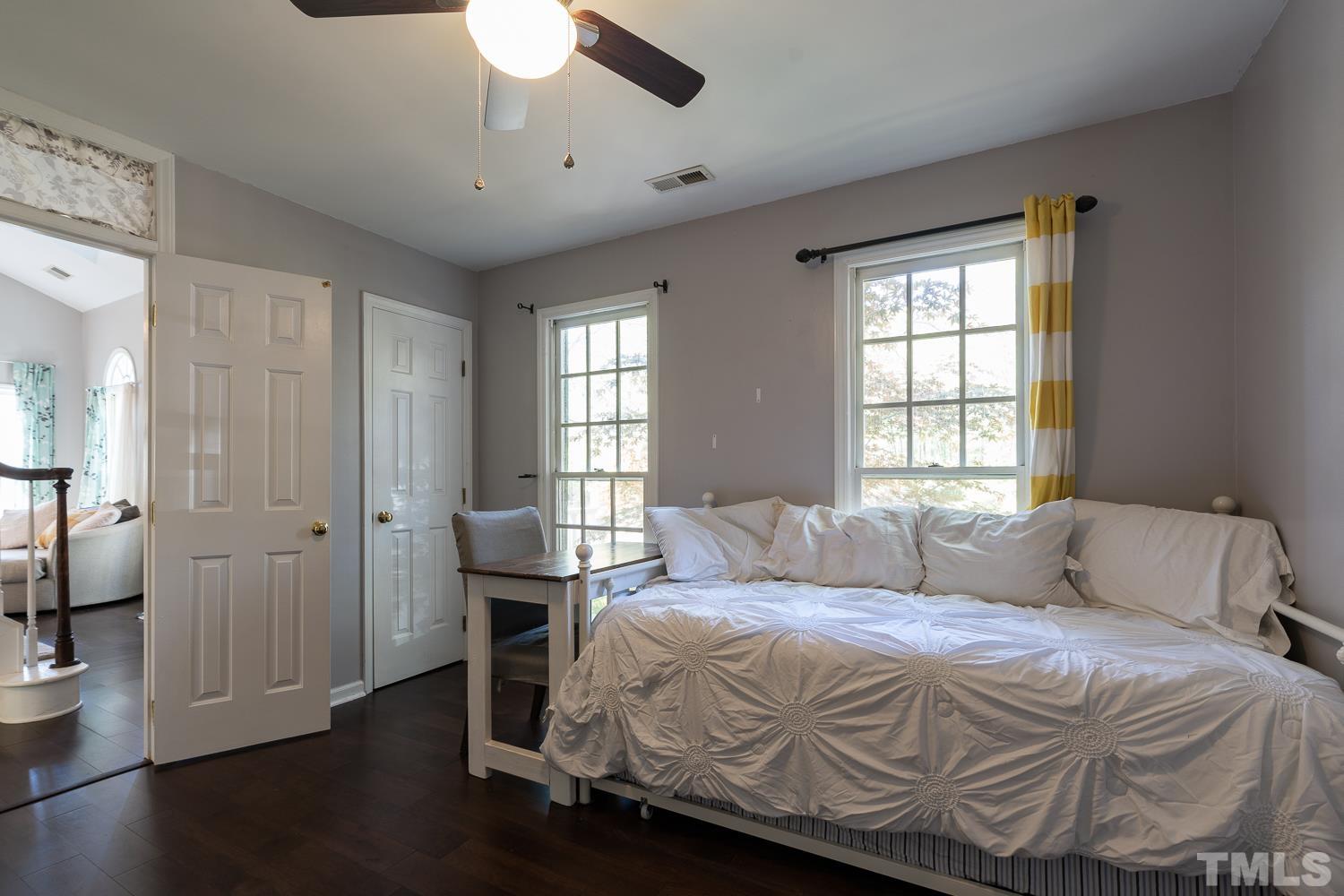 3604 Norway Court Raleigh, NC 27616 - Photo 4 of 26 a bedroom with a bed and a window