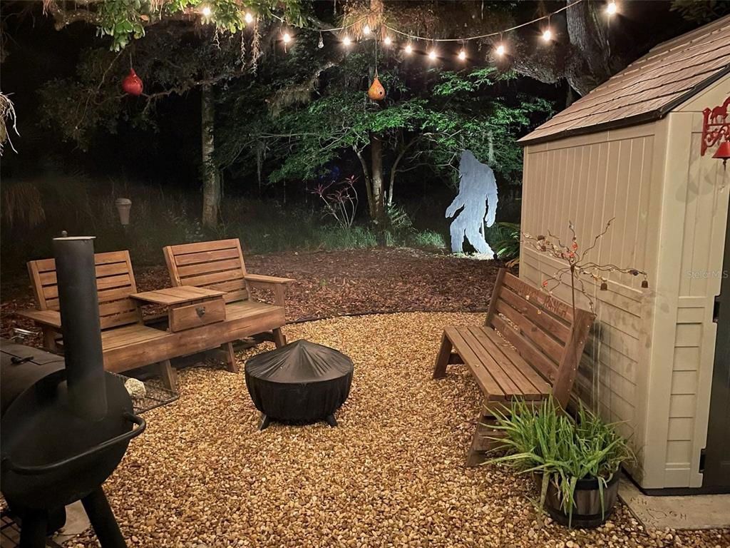 389 Longhorn Drive River Ranch, FL 33867 - Photo 5 of 11 a view of a backyard with sitting area