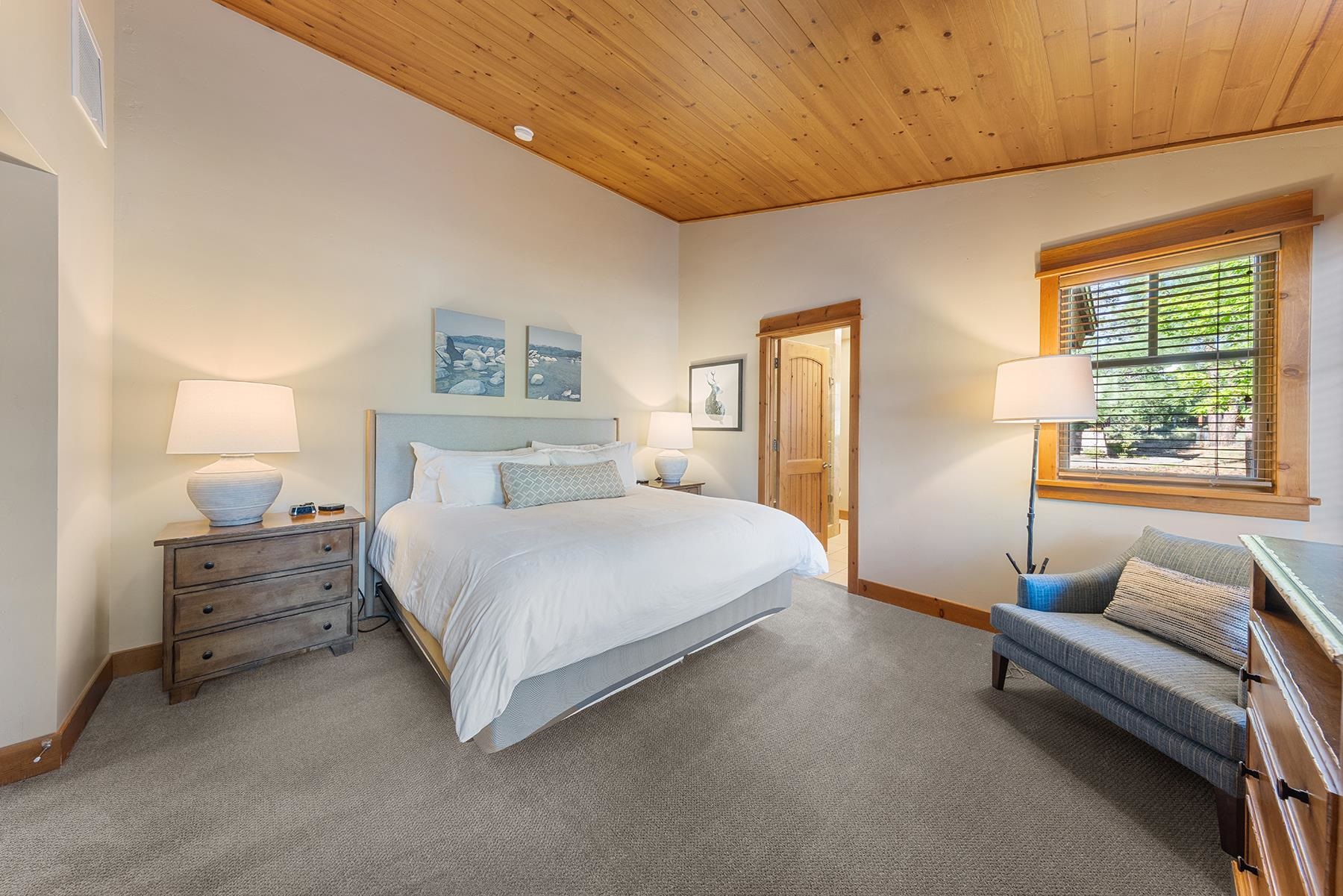 12303 Lookout Loop, Unit F0913 Truckee, CA 96161 - Photo 13 of 27 a bedroom with a bed and a couch