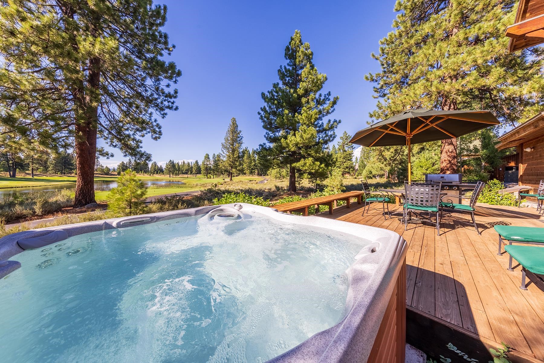 12303 Lookout Loop, Unit F0913 Truckee, CA 96161 - Photo 23 of 27 a view of a swimming pool with a patio and wooden floor