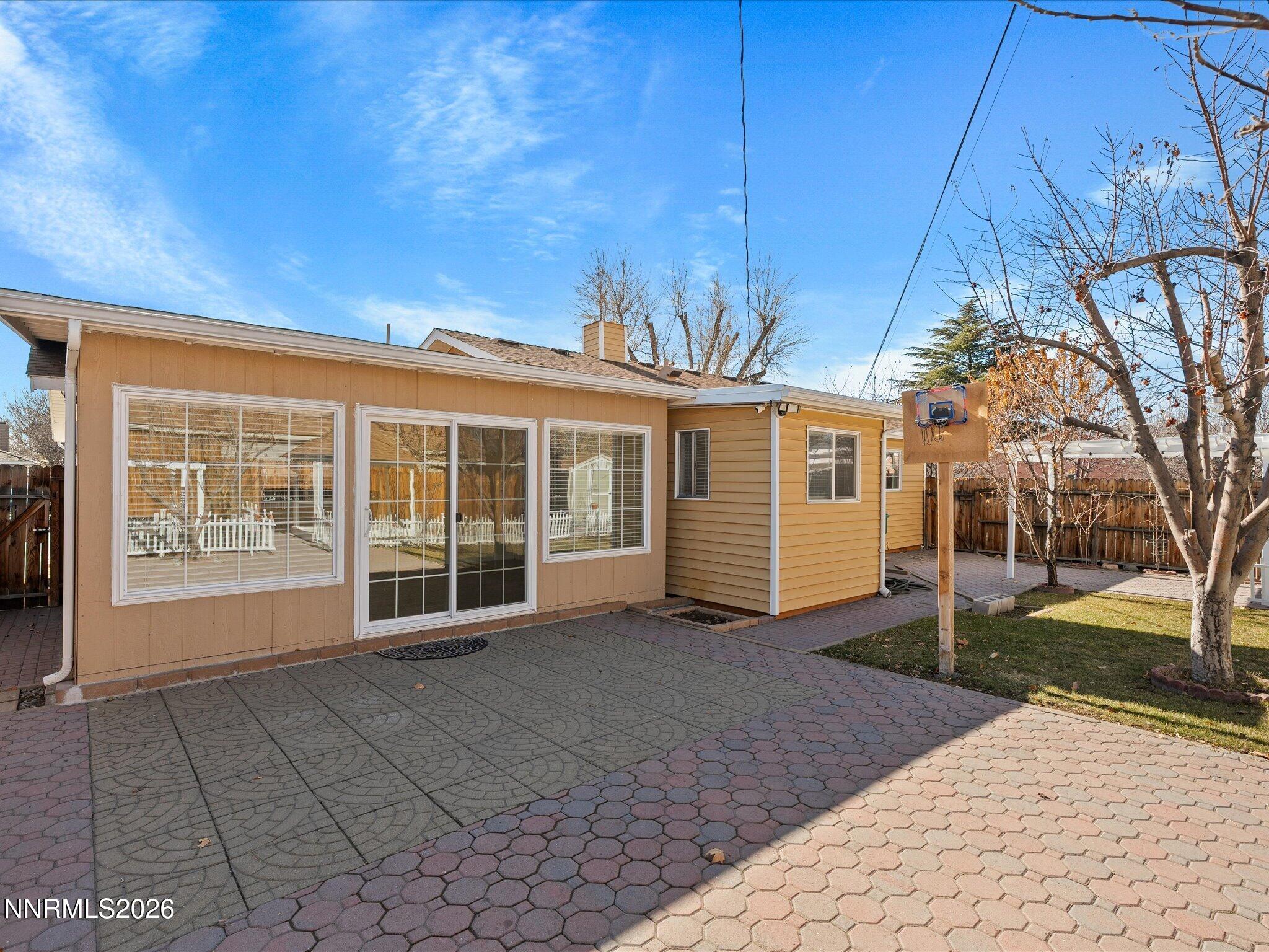1540 Tyler Way Sparks, NV 89431 - Photo 31 of 35 a view of a house with a yard