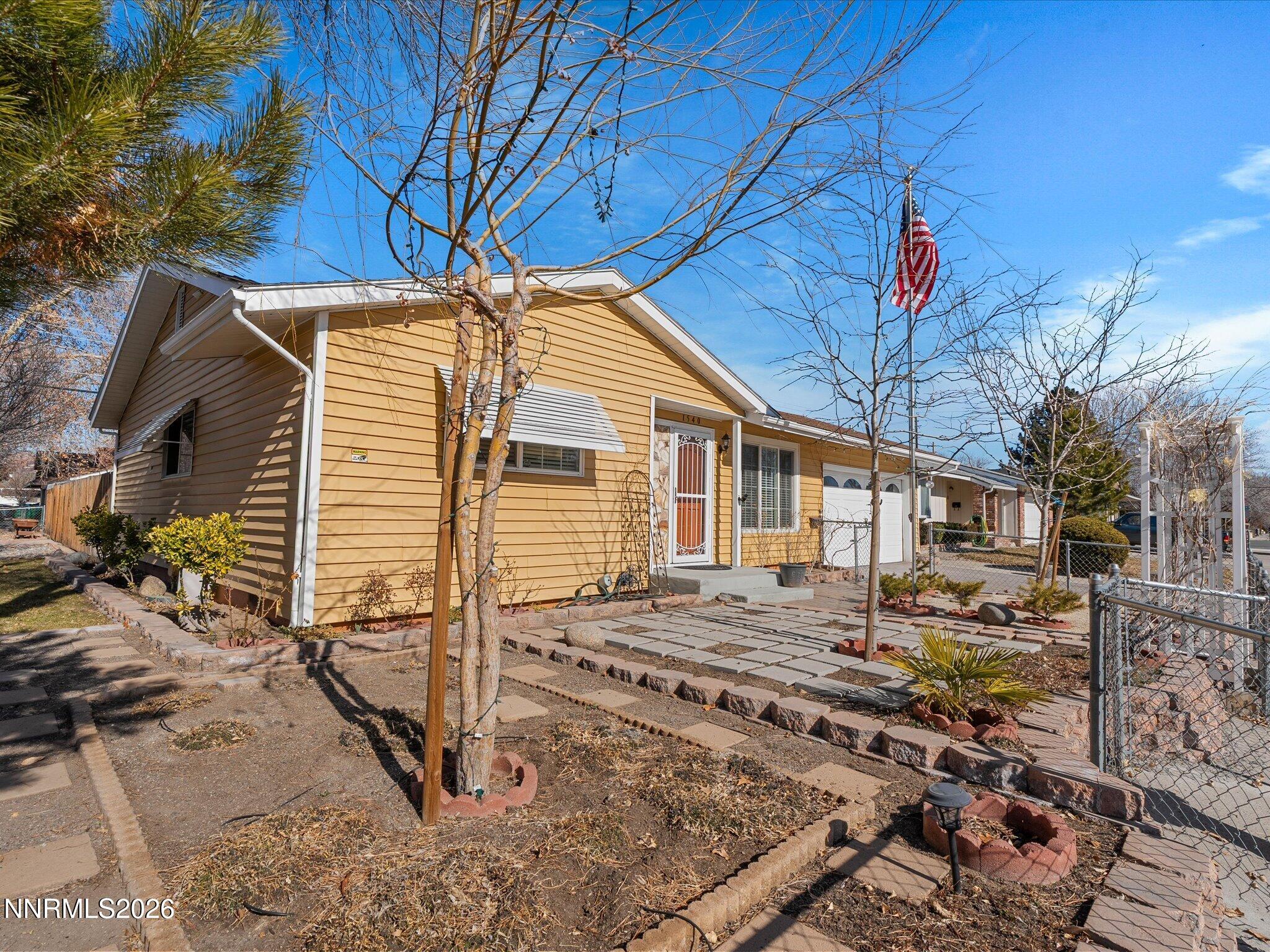 1540 Tyler Way Sparks, NV 89431 - Photo 4 of 35 a view of a house with a patio
