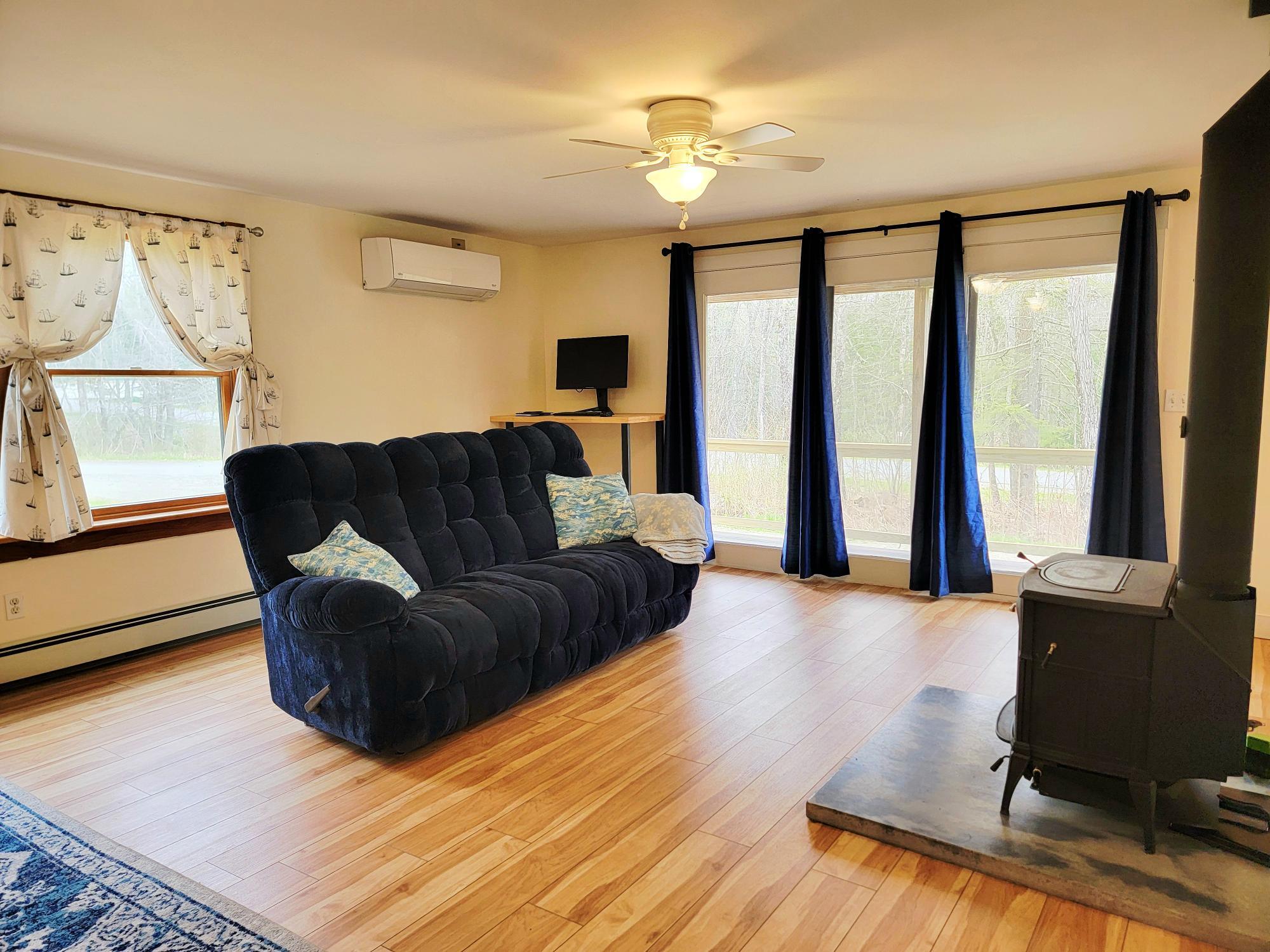 6 Skyscraper Hill Road Brooks, ME 04921 - Photo 10 of 44 Open Living and Dining Room