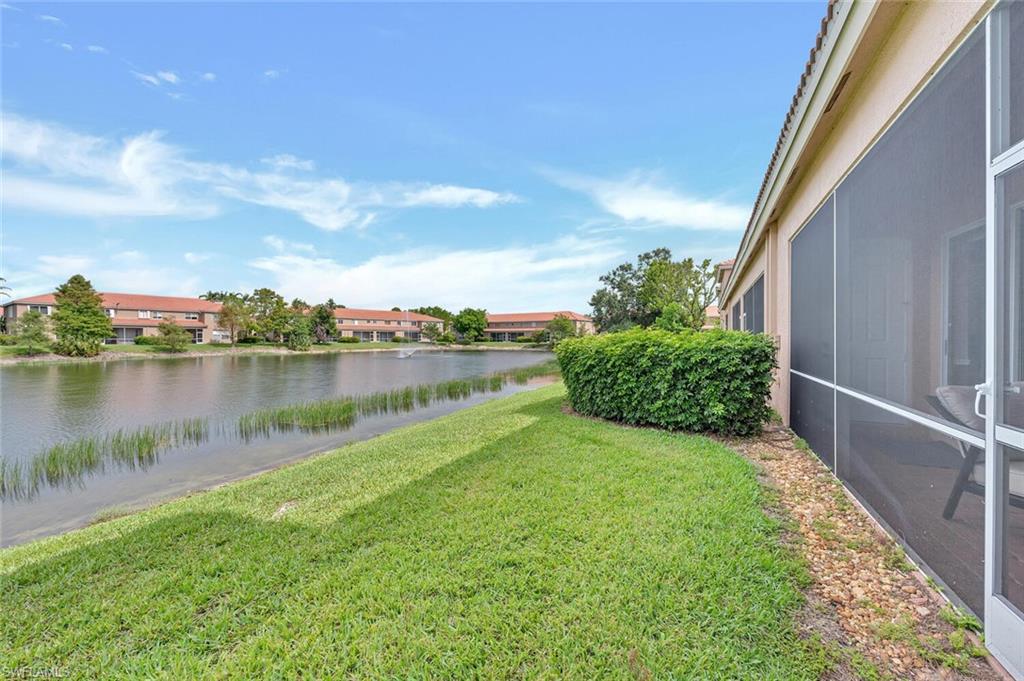 17528 Cherry Ridge Lane Fort Myers, FL 33967 - Photo 16 of 18 a view of a garden with a lake