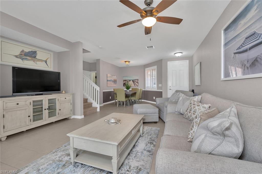 17528 Cherry Ridge Lane Fort Myers, FL 33967 - Photo 4 of 18 a living room with furniture and a flat screen tv