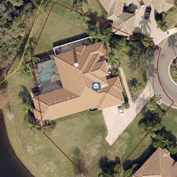 7808 Derby Court Lakewood Ranch, FL 34202 - Photo 1 of 1 an aerial view of a house with a yard