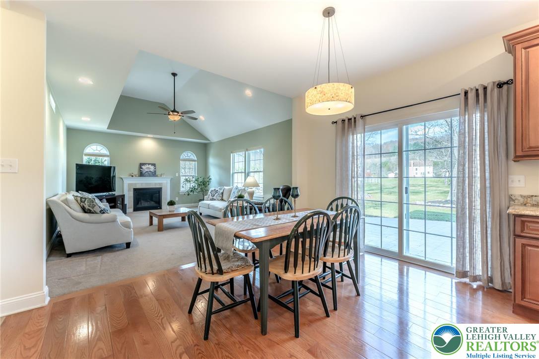 3505 Woodbyne Road Hellertown, PA 18055 - Photo 15 of 66 a view of a dining room with furniture window and wooden floor