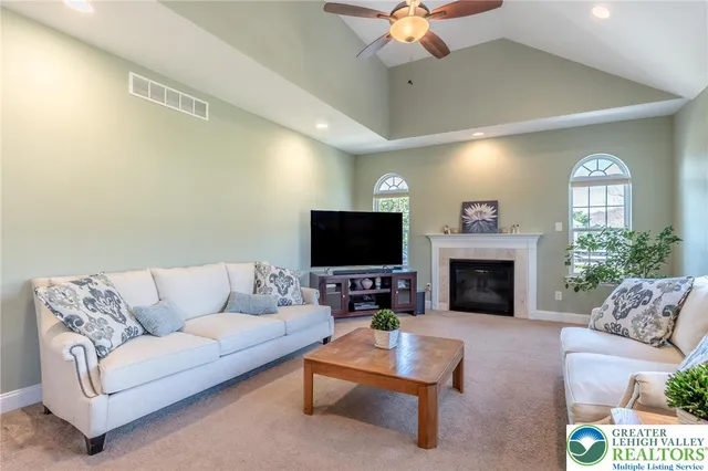 a living room with a fireplace