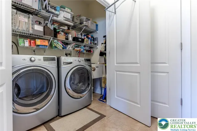 a view of a hallway with windows and stairs