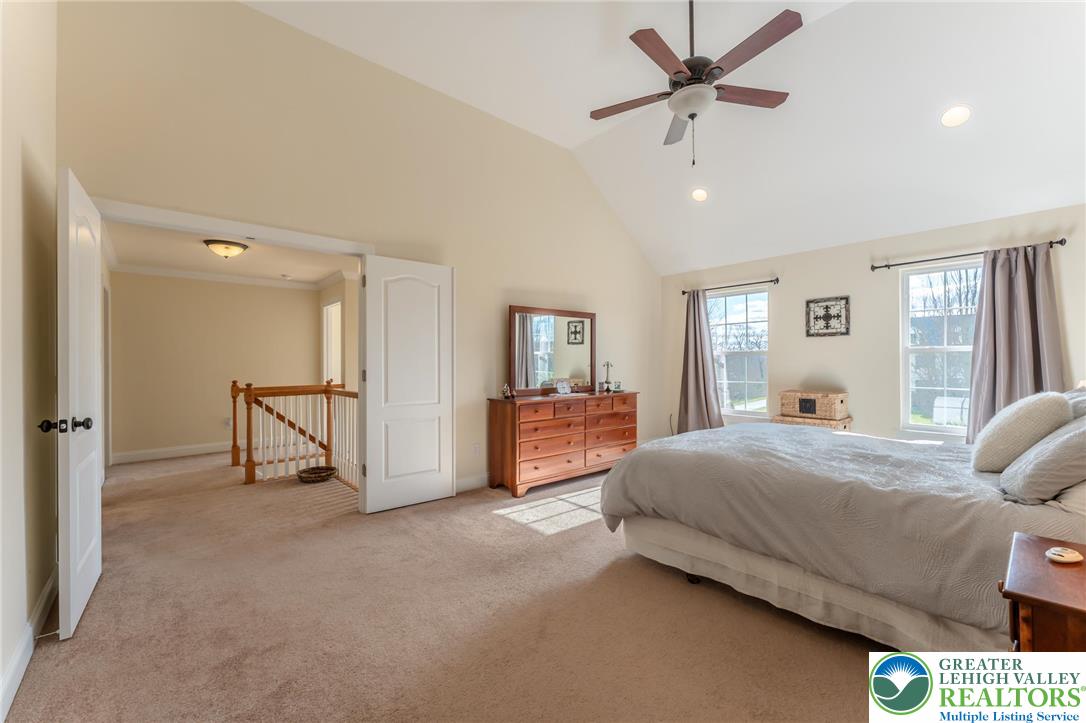 3505 Woodbyne Road Hellertown, PA 18055 - Photo 29 of 66 a living room with a bed furniture and next to a window
