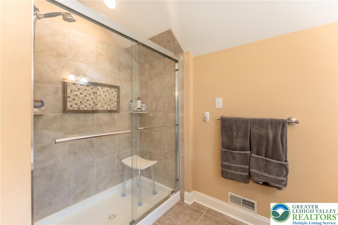 3505 Woodbyne Road Hellertown, PA 18055 - Photo 33 of 66 a bathroom with a shower and a sink