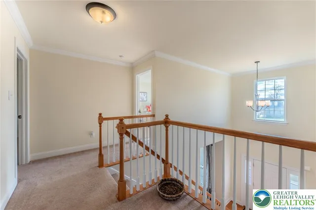 a spacious bedroom with a bed and a table